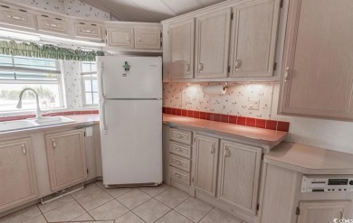 **Coastal Charm & Resort Living in North Myrtle Beach!** on Tidewater Golf Club and Plantation in South Carolina - for sale on GolfHomes.com, golf home, golf lot