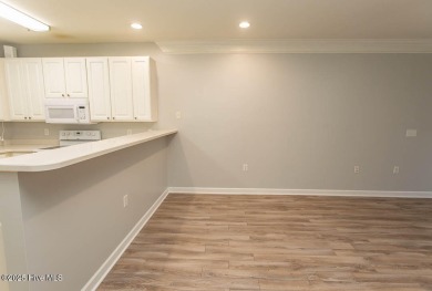 Perfect first floor 2BR/2BA beach condo priced to sell with on Crow Creek Golf Club in North Carolina - for sale on GolfHomes.com, golf home, golf lot