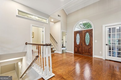 Tucked in Atlanta Country Club's quiet interior, this refreshed on Atlanta Country Club in Georgia - for sale on GolfHomes.com, golf home, golf lot