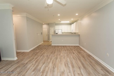 Perfect first floor 2BR/2BA beach condo priced to sell with on Crow Creek Golf Club in North Carolina - for sale on GolfHomes.com, golf home, golf lot