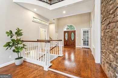 Tucked in Atlanta Country Club's quiet interior, this refreshed on Atlanta Country Club in Georgia - for sale on GolfHomes.com, golf home, golf lot