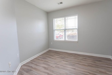 Perfect first floor 2BR/2BA beach condo priced to sell with on Crow Creek Golf Club in North Carolina - for sale on GolfHomes.com, golf home, golf lot