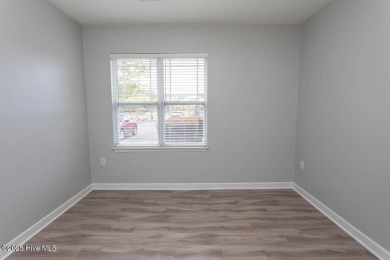 Perfect first floor 2BR/2BA beach condo priced to sell with on Crow Creek Golf Club in North Carolina - for sale on GolfHomes.com, golf home, golf lot