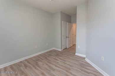 Perfect first floor 2BR/2BA beach condo priced to sell with on Crow Creek Golf Club in North Carolina - for sale on GolfHomes.com, golf home, golf lot