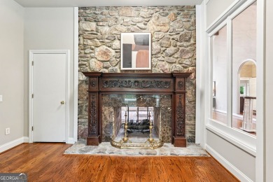 Tucked in Atlanta Country Club's quiet interior, this refreshed on Atlanta Country Club in Georgia - for sale on GolfHomes.com, golf home, golf lot