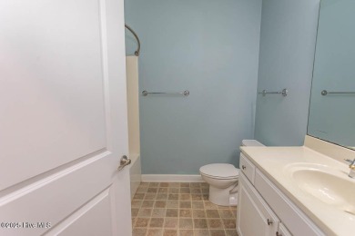 Perfect first floor 2BR/2BA beach condo priced to sell with on Crow Creek Golf Club in North Carolina - for sale on GolfHomes.com, golf home, golf lot