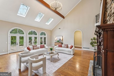 Tucked in Atlanta Country Club's quiet interior, this refreshed on Atlanta Country Club in Georgia - for sale on GolfHomes.com, golf home, golf lot