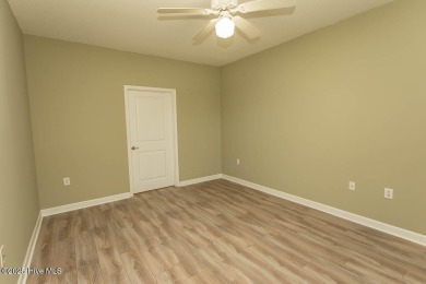 Perfect first floor 2BR/2BA beach condo priced to sell with on Crow Creek Golf Club in North Carolina - for sale on GolfHomes.com, golf home, golf lot