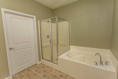 Perfect first floor 2BR/2BA beach condo priced to sell with on Crow Creek Golf Club in North Carolina - for sale on GolfHomes.com, golf home, golf lot