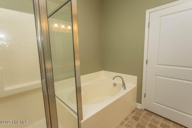 Perfect first floor 2BR/2BA beach condo priced to sell with on Crow Creek Golf Club in North Carolina - for sale on GolfHomes.com, golf home, golf lot