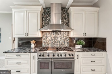 Tucked in Atlanta Country Club's quiet interior, this refreshed on Atlanta Country Club in Georgia - for sale on GolfHomes.com, golf home, golf lot