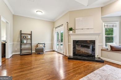 Tucked in Atlanta Country Club's quiet interior, this refreshed on Atlanta Country Club in Georgia - for sale on GolfHomes.com, golf home, golf lot