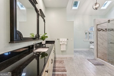 Tucked in Atlanta Country Club's quiet interior, this refreshed on Atlanta Country Club in Georgia - for sale on GolfHomes.com, golf home, golf lot