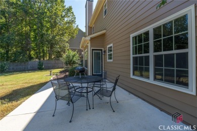 Welcome home to this beautifully maintained 4 bedroom 2 1/2 bath on Cedar Lake Golf Club in Georgia - for sale on GolfHomes.com, golf home, golf lot