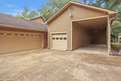 Discover this spacious 4-Bedroom, 2.5-bath home with at least on Castlewoods Golf Club in Mississippi - for sale on GolfHomes.com, golf home, golf lot