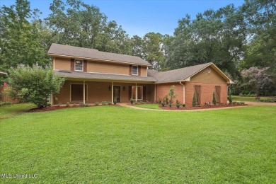 Discover this spacious 4-Bedroom, 2.5-bath home with at least on Castlewoods Golf Club in Mississippi - for sale on GolfHomes.com, golf home, golf lot