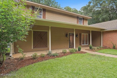 Discover this spacious 4-Bedroom, 2.5-bath home with at least on Castlewoods Golf Club in Mississippi - for sale on GolfHomes.com, golf home, golf lot