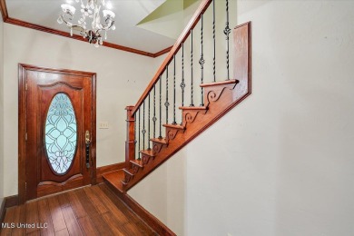 Discover this spacious 4-Bedroom, 2.5-bath home with at least on Castlewoods Golf Club in Mississippi - for sale on GolfHomes.com, golf home, golf lot
