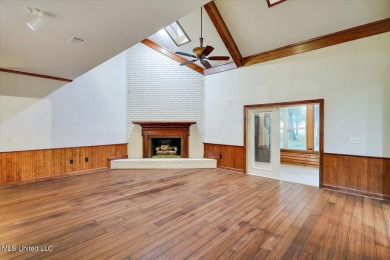 Discover this spacious 4-Bedroom, 2.5-bath home with at least on Castlewoods Golf Club in Mississippi - for sale on GolfHomes.com, golf home, golf lot