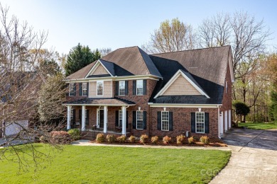 Welcome to your picturesque full-brick home, nestled on a wooded on The Divide Golf Club in North Carolina - for sale on GolfHomes.com, golf home, golf lot