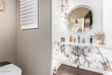 Perched in the prestigious gated community of Troon Ridge on Troon Country Club in Arizona - for sale on GolfHomes.com, golf home, golf lot