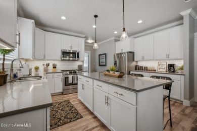 This downtown charmer has a welcoming, open floor plan that was on Coeur D Alene Resort Golf Course in Idaho - for sale on GolfHomes.com, golf home, golf lot