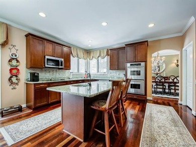 This stunning brick colonial home is nestled on a spacious and on Farmington Hills Golf Club in Michigan - for sale on GolfHomes.com, golf home, golf lot