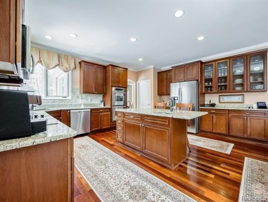 This stunning brick colonial home is nestled on a spacious and on Farmington Hills Golf Club in Michigan - for sale on GolfHomes.com, golf home, golf lot
