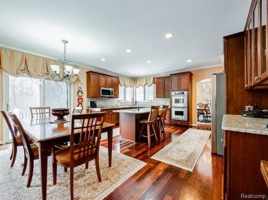 This stunning brick colonial home is nestled on a spacious and on Farmington Hills Golf Club in Michigan - for sale on GolfHomes.com, golf home, golf lot