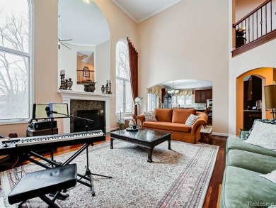 This stunning brick colonial home is nestled on a spacious and on Farmington Hills Golf Club in Michigan - for sale on GolfHomes.com, golf home, golf lot