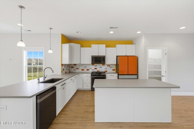 Sitting in the heart of The Preserve at Oak Ridge, 116 Deerberry on The Preserve 9 Hole Golf Course in Tennessee - for sale on GolfHomes.com, golf home, golf lot