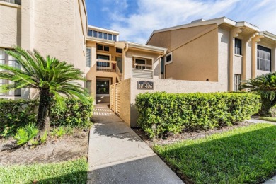 Welcome to this inviting FIRST FLOOR condo in the gated on East Lake Woodlands Country Club in Florida - for sale on GolfHomes.com, golf home, golf lot