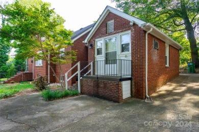 Discover this charming brick home in Revolution Park, minutes on Carolina Golf Club in North Carolina - for sale on GolfHomes.com, golf home, golf lot