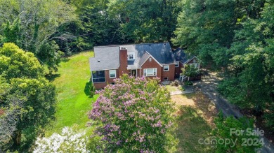 Discover this charming brick home in Revolution Park, minutes on Carolina Golf Club in North Carolina - for sale on GolfHomes.com, golf home, golf lot