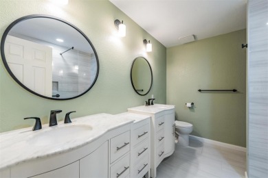 Welcome to this inviting FIRST FLOOR condo in the gated on East Lake Woodlands Country Club in Florida - for sale on GolfHomes.com, golf home, golf lot