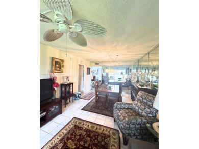 Beautifully maintained 1-bedroom, 1-bathroom condo nestled in a on Oriole Golf and Tennis Club in Florida - for sale on GolfHomes.com, golf home, golf lot
