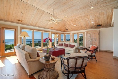 This classic, oceanfront four-bedroom home with an elevator is on The Country Club of the Crystal Coast in North Carolina - for sale on GolfHomes.com, golf home, golf lot