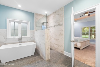 Welcome to this beautifully upgraded 4-bedroom, 3-bathroom home on Sea Trail Golf Resort in North Carolina - for sale on GolfHomes.com, golf home, golf lot