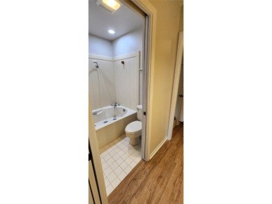 Ground level condo overlooking pool and fairwaypletely painted on Rockport Country Club in Texas - for sale on GolfHomes.com, golf home, golf lot