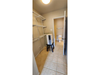 Ground level condo overlooking pool and fairwaypletely painted on Rockport Country Club in Texas - for sale on GolfHomes.com, golf home, golf lot