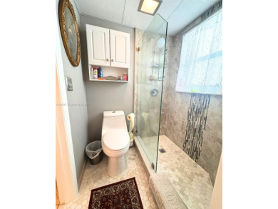 Beautifully maintained 1-bedroom, 1-bathroom condo nestled in a on Oriole Golf and Tennis Club in Florida - for sale on GolfHomes.com, golf home, golf lot