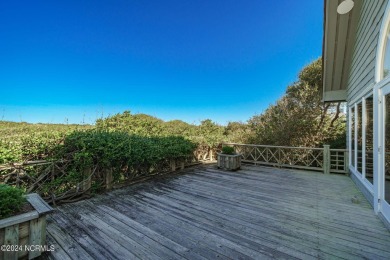 This classic, oceanfront four-bedroom home with an elevator is on The Country Club of the Crystal Coast in North Carolina - for sale on GolfHomes.com, golf home, golf lot