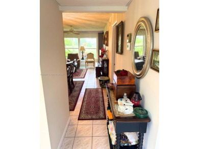 Beautifully maintained 1-bedroom, 1-bathroom condo nestled in a on Oriole Golf and Tennis Club in Florida - for sale on GolfHomes.com, golf home, golf lot