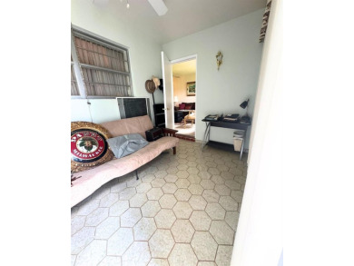 Beautifully maintained 1-bedroom, 1-bathroom condo nestled in a on Oriole Golf and Tennis Club in Florida - for sale on GolfHomes.com, golf home, golf lot