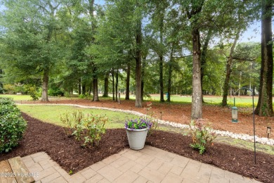 Welcome to this beautifully upgraded 4-bedroom, 3-bathroom home on Sea Trail Golf Resort in North Carolina - for sale on GolfHomes.com, golf home, golf lot