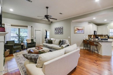Come see this beautiful and spacious home nestled inside the on Lake Caroline Golf Club in Mississippi - for sale on GolfHomes.com, golf home, golf lot