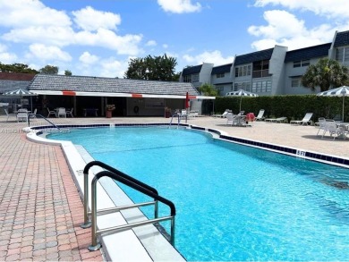 Beautifully maintained 1-bedroom, 1-bathroom condo nestled in a on Oriole Golf and Tennis Club in Florida - for sale on GolfHomes.com, golf home, golf lot
