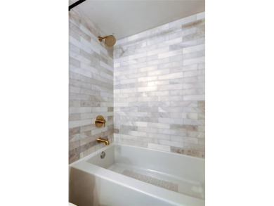 Welcome to this nicely updated 2 bedroom, 2 bathroom condo on Cove Cay Country Club in Florida - for sale on GolfHomes.com, golf home, golf lot
