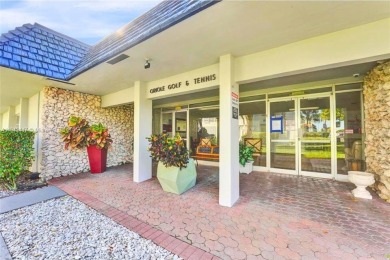Beautifully maintained 1-bedroom, 1-bathroom condo nestled in a on Oriole Golf and Tennis Club in Florida - for sale on GolfHomes.com, golf home, golf lot