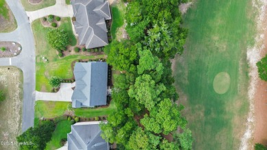 Welcome to this beautifully upgraded 4-bedroom, 3-bathroom home on Sea Trail Golf Resort in North Carolina - for sale on GolfHomes.com, golf home, golf lot